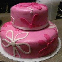 Pink W/white Flowers covered with fondant and fondant flowers