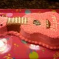 Pink Guitar Cake buttercream star tipped decorated