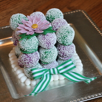 Daisy Cake Truffle Cake i made this experimental cake for a dear friend of mine. it is 27 vanilla with vanilla buttercream cake truffles, which i stacked to make a...