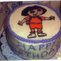 Dora Cake This was a 2 layer choc cake with buttercream icing and the image done in glaze