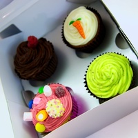 Boxed Cupcakes Mint choc chip, carrot cake, raspberry choc and sweet dreams.