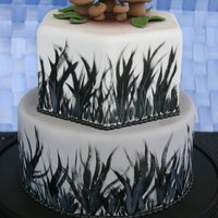 Mushroom Patch Mushroom Patch cake! Chocolate Fudge cake with a dark chocolate ganache filling. Two-tone grey fondant with hand painted grass and gum...