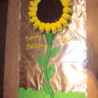 Peep Sunflower This is a Peep Sunflower cake that I believe was first featured in a Taste of Home magazine. I just added a fondant stem and leaves. The...