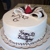 Birthyday Cake Chocolate cake with custard & strawberry filling. Top decor made with gumpaste and chocolate with chocolate decor.