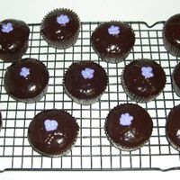 Chocolate Canache Cupcakes With Candy Violets 
