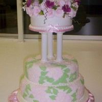 Royal Easter Show Entry 2008 Three tier wedding cake iced in white fondant. Bottom layers with brush-embroidered roses. Top layer with simple stringwork and an...