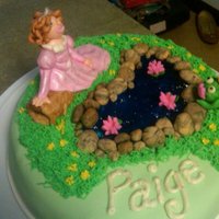 Princess And The Frog Yellow cake, BC filling, fondant covered. Tinted piping gel for the pond.