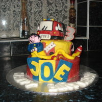 Fireman Cake This was a cake for a friend's relative who was turning 3 and obsessed with Fireman Sam. I turned it into 'Fireman Joe' :)