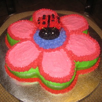 1St Birthday Flower/ladybug This was for a friends daughters 1st bday! she wanted a ladybug/flower cake. All buttercream. ladybug was extra cake stacked and formed for...