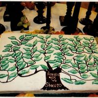Family Tree Full sheet cake, half devils food, half french vanilla, iced in crusting buttercream. Leaves are mmf and there are about 100, give or take...