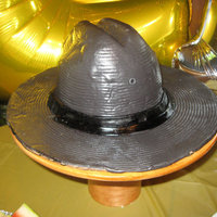 Deputy Patrol Hat carved hat out of yellow pound cake. Covered in fondant.