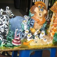 Madagascar 3D I made the lemurs & penguins from sugarpaste a couple of days earlier. The rest are cake. Melman (giraffe) actually collapsed twice...