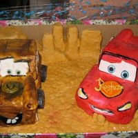Lightning Mc Queen Mater was small boxes covered in fondant cos my cake didnt come out right and McQueen was chocolate cake covered with fondant.