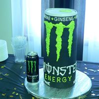 Dave's Monster Can This is for a guy who LOVES the Monster Energy drink. It's 15 1/2 in high and 6 in diameter. Covered with fondant and then piped on...