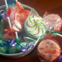 Cake Pops Cake lollipops made out of vanilla sprinkles cake bread and white chocolate coating (and some have shredded coconut (i.e. top right))...