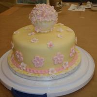 Wilton Fondant Class Final Cake Cherry blossoms with gumpaste topper, brush embroidery flowers on stenciled fondant base