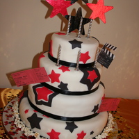 Oscars Themed 60Th Birthday Cake My first attempt at a stacked cake! The clapperboards and movie tickets contained specifics about the birthday celebration, person...