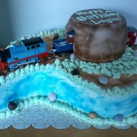 Thomas The Train this is actually an ice cream cake with just the tunnel on top cake