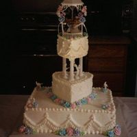 Small Cake For Small Wedding The wedding was their second and they didn't want a big affair. The color scheme was multiple colors. 12" square, 9" heart,...