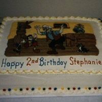 Buttercream Transfer For my daughter's third birthday. She loved Pinochio. I got a picture, taped it on the back of a pan and put a piece of plastic wrap...