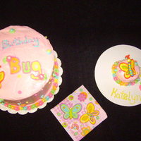 1St Birthday Cake The cake is chocolate and strawberry with cream cheese icing. The butterflies are made out of royal icing.