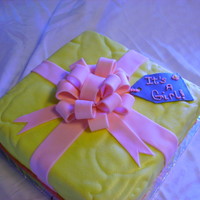 Present Cake The cake was chocolate and strawberry with chocolate filling and butter cream. I covered the cake in fondant and a fondant bow. This was my...