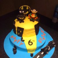 Batman And Robin I saw another picture and took inspiration from it thanks to whoever made that cake cause it really helped with making my figures...