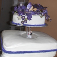 Purple Orchid Wedding Cake This cake was done to match a purple and gold theme