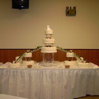 Traditional Wedding Cake I did this cake for my eldest son's wedding. Each layer was a different flavor. The bride did not get to know what her cake was going...
