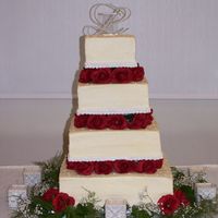 Monogram Wedding Cake This 7", 10", 13", 16" square wedding cake was entirely done in red velvet cake with creme cheese frosting. The bride&#...