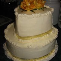 50Th Anniversary Cake I made this cake for my friend's grandparent's 50th An niversary. The top is the shape of a heart.