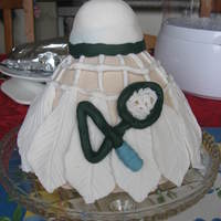 Badminton Shuttlecock madeira cake covered in fondant with a bent badminton racket shaped into number 40 for a friend's 40th birthday....