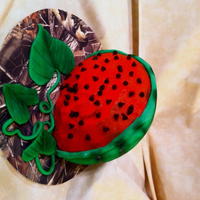 Watermelon Cake... Half ball mold, white cake dyed red, fondant rind airbrushed to add detail and depth...