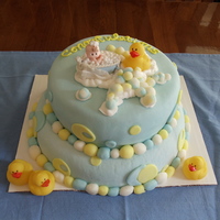 Baby Shower Cake Brandy cake was a challenge cause we never did it before, but customer said it was spectacular, and now wants one tier of her wedding cake...