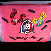 Monster High 1/2 Sheet... 3 layers, black and pink inside, hand cut fondant decorations (except bats), those were cut with a cookie cutter...