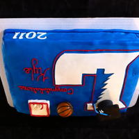 Graduation Cake 1/2 sheet, red and blue inside, fondant / gumpaste decorations... 2011 cut out with Cricut cake, cap and basketball backboard are graham...