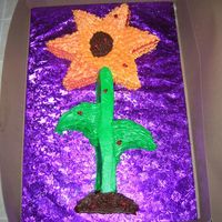 Sunflower I wasn't to thrilled about the outcome of this cake. I did this in cake class. It was 2, 8in. cakes cut up and put together. All...