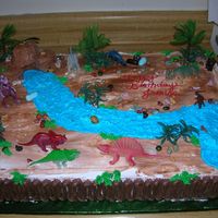 Dinosaurs Sheet cake, biggest one I've ever made. French Vanilla cake w/ fresh strawberries and whip cream filling. Very fun to make. Thanks for...