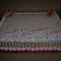 Happy Birthday Chocolate cake w/ fresh strawberries and whip cream filling. Customer wanted party colors w/ balloons. She was going to put her own toys on...