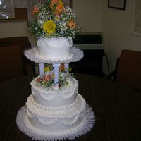 Wedding Cake This was my first time doing a wedding cake. It wasn't for a real wedding, we did this for our final class. I learned a lot. Trail and...