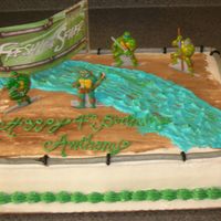 Ninja Turtles White cake w/ fresh fruit filling. All buttercream.