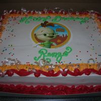 Chicken Little Edible Image Chocolate cake w/ fresh bananas and whipped cream filling.