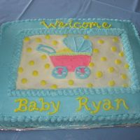 Baby Buggy Cake This is a cake I made for my friend's baby shower. The buggy matched the plates and napkins that we had. Half of the cake is yellow...