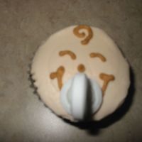 Baby Face Cupcake I made these cupcakes for my friend's baby shower. The pacifiers are lifesaver mints.