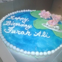 Pond Cake! Strawberry cake with strawberry buttercream... covered in vanilla fondant. Lotuses are gumpaste