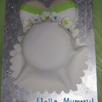 Belly Cake Fondant covered vanilla cake with chocolate buttercream.