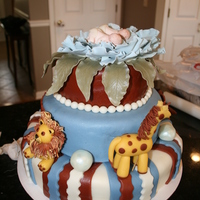 Baby Shower Cake For Twins Jungle nursery theme. Ist baby shower cake I have made (also my 5th cake so far)Hand molded all 4 animals. 12in , 8in and 4in cakes.