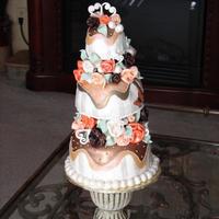 Topiary Cake This design was inspired by another Colette Peter's creation. Each tier was carved into a soft, round shape and embellished with...