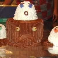 Stump & Ghosts This is one that my dad loves to do every year and is very simple!! Makes a great give away cake.