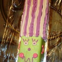 Green Lady Frankenstien We just wanted to do a simple cake for give away so we did the lady and changed her up from the original wilton idea just a little.